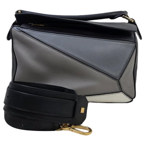 Puzzle leather handbag