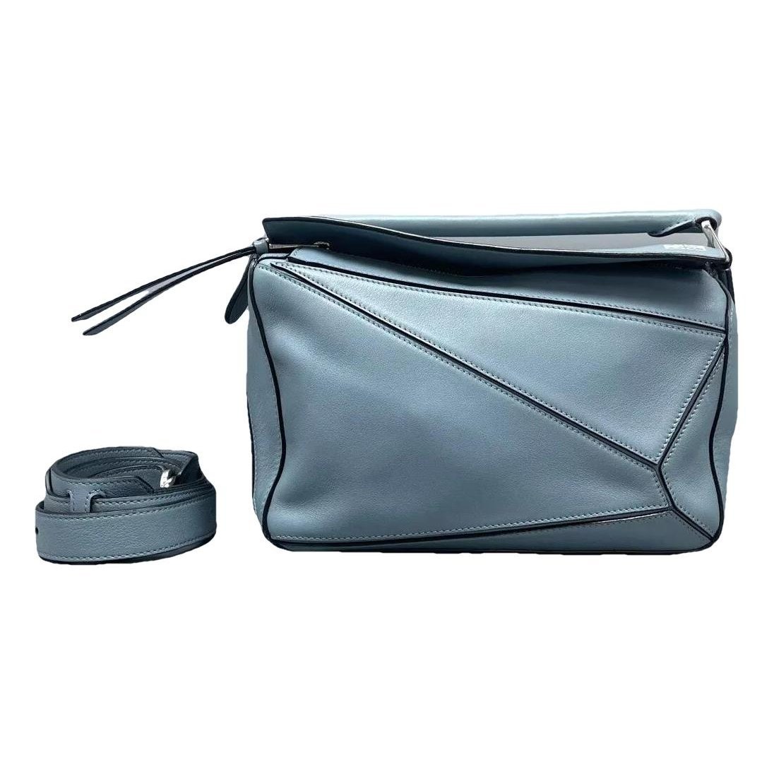 Puzzle leather crossbody bag