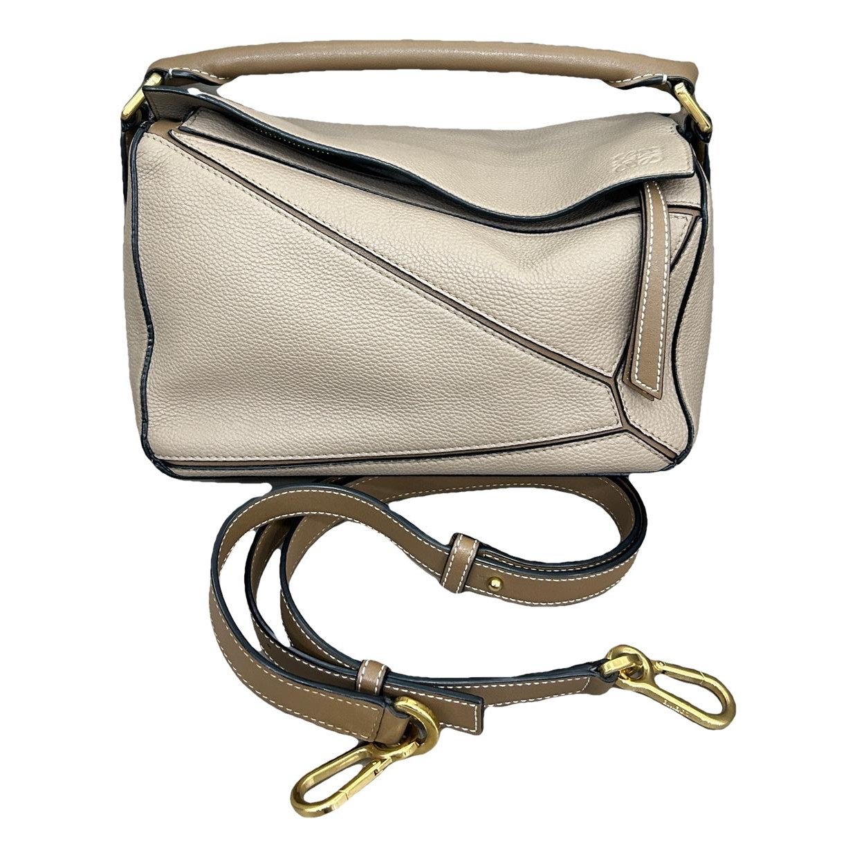 Puzzle leather handbag