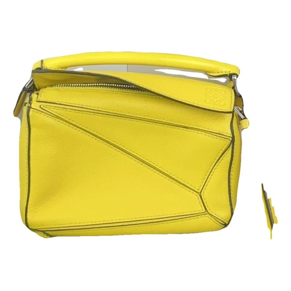 Puzzle leather handbag