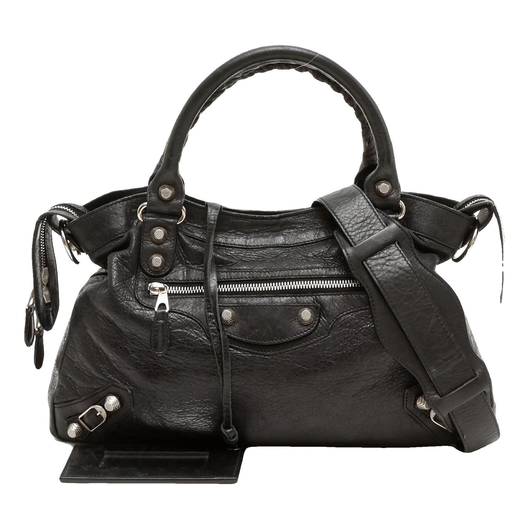 First leather handbag