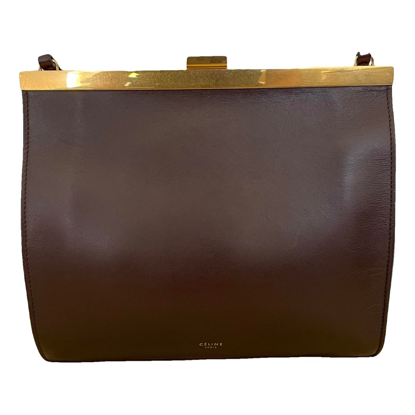 Clasp leather handbag