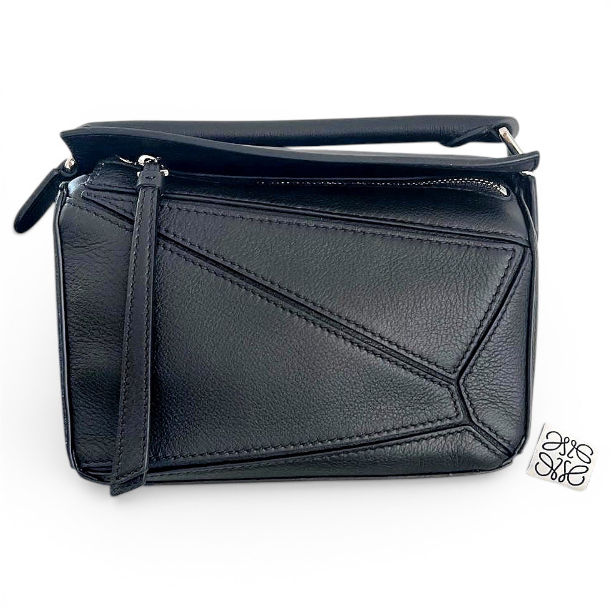 Puzzle leather handbag