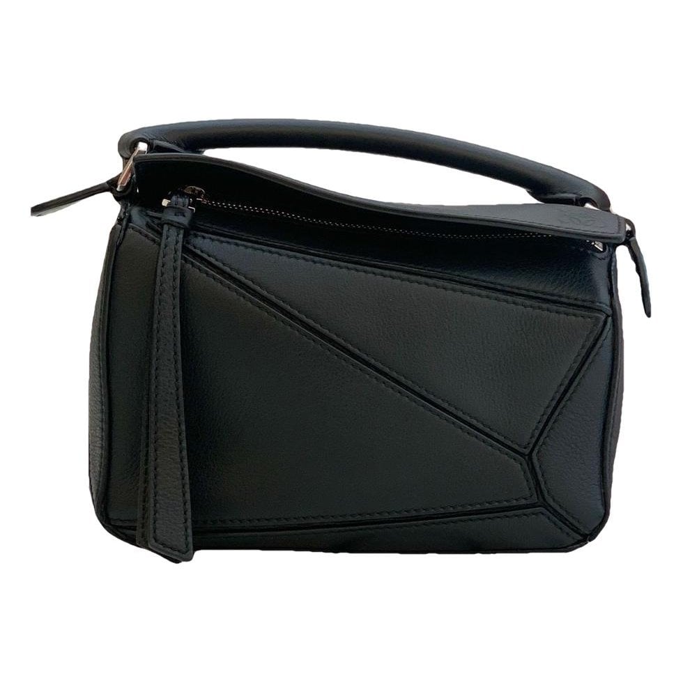 Puzzle leather handbag