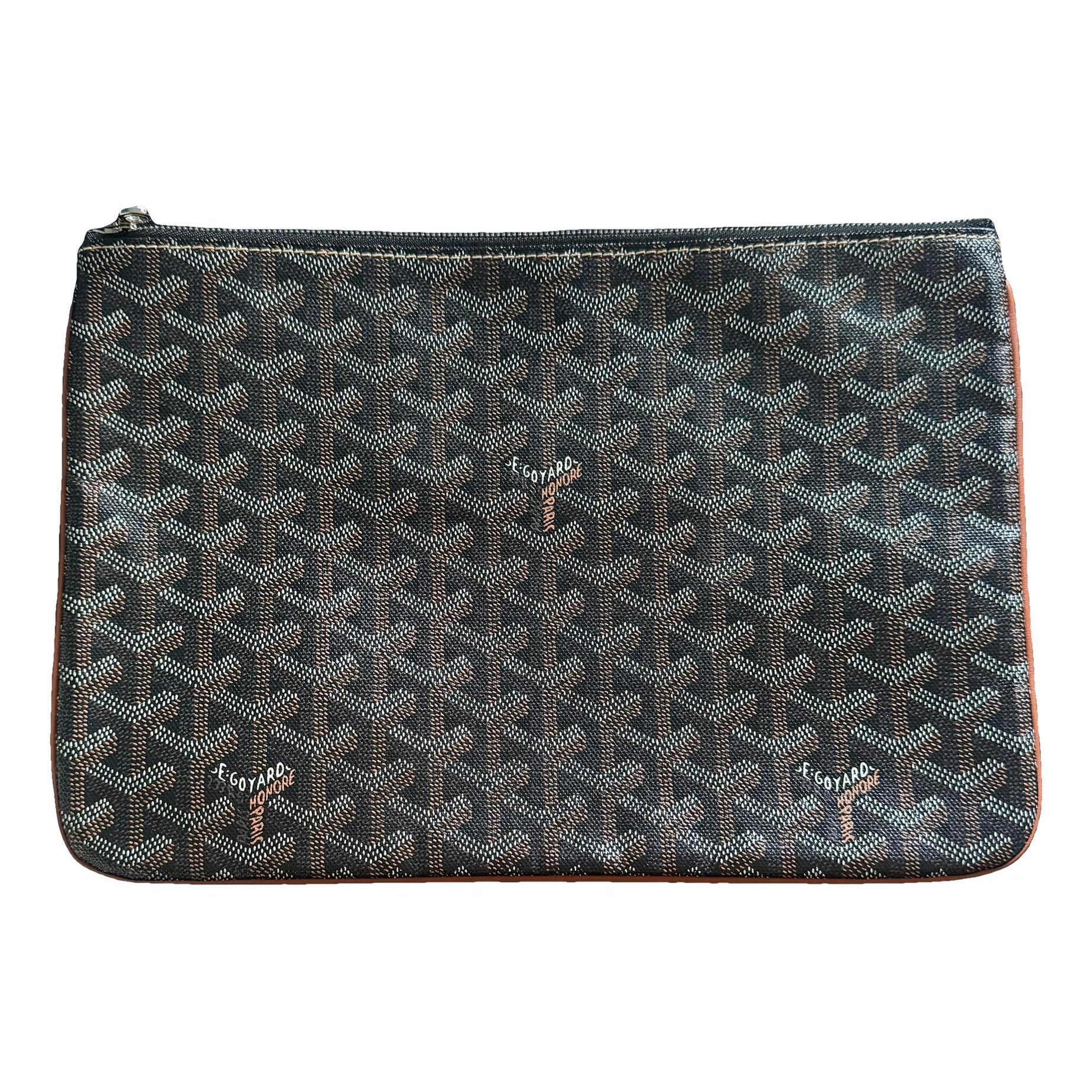 Sénat cloth clutch bag