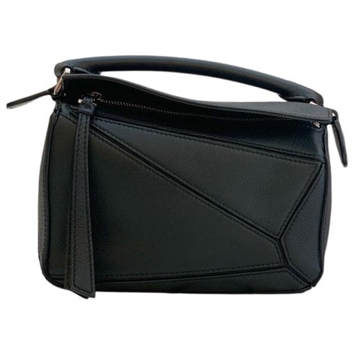 Puzzle leather handbag