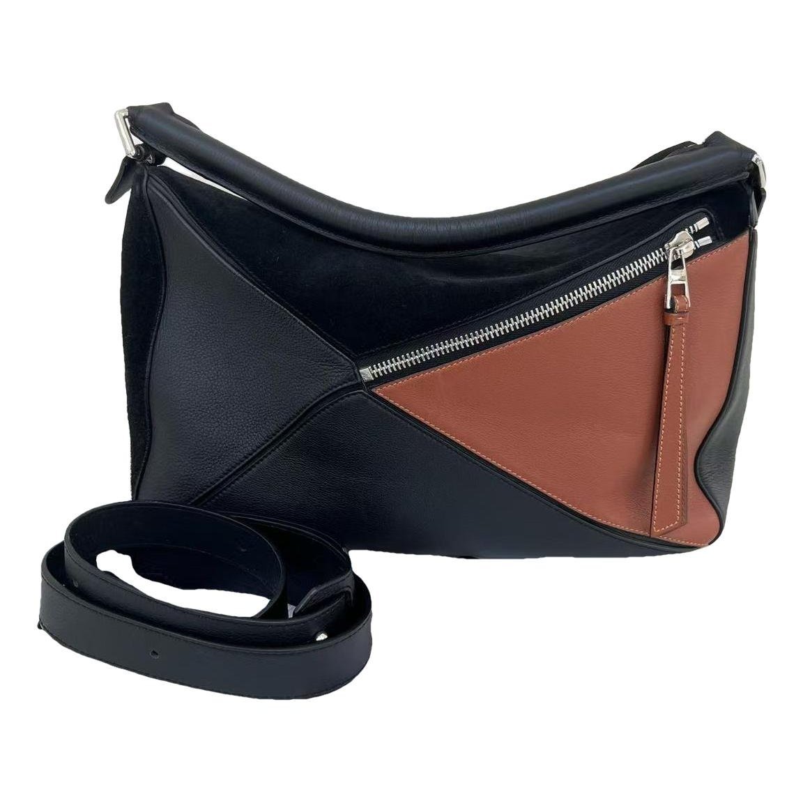 Puzzle leather handbag