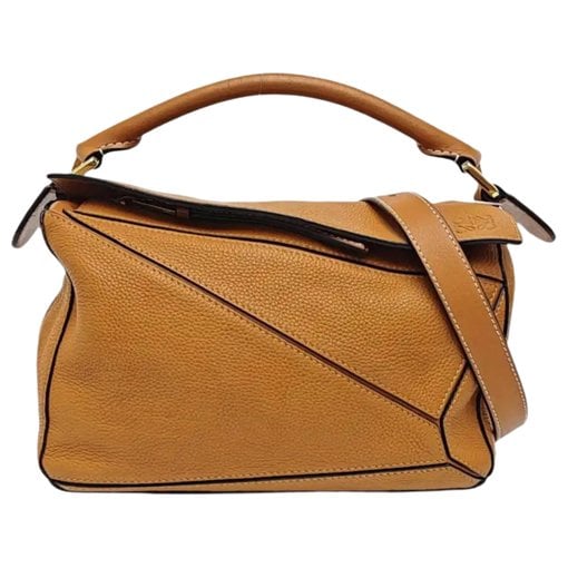 Puzzle leather handbag