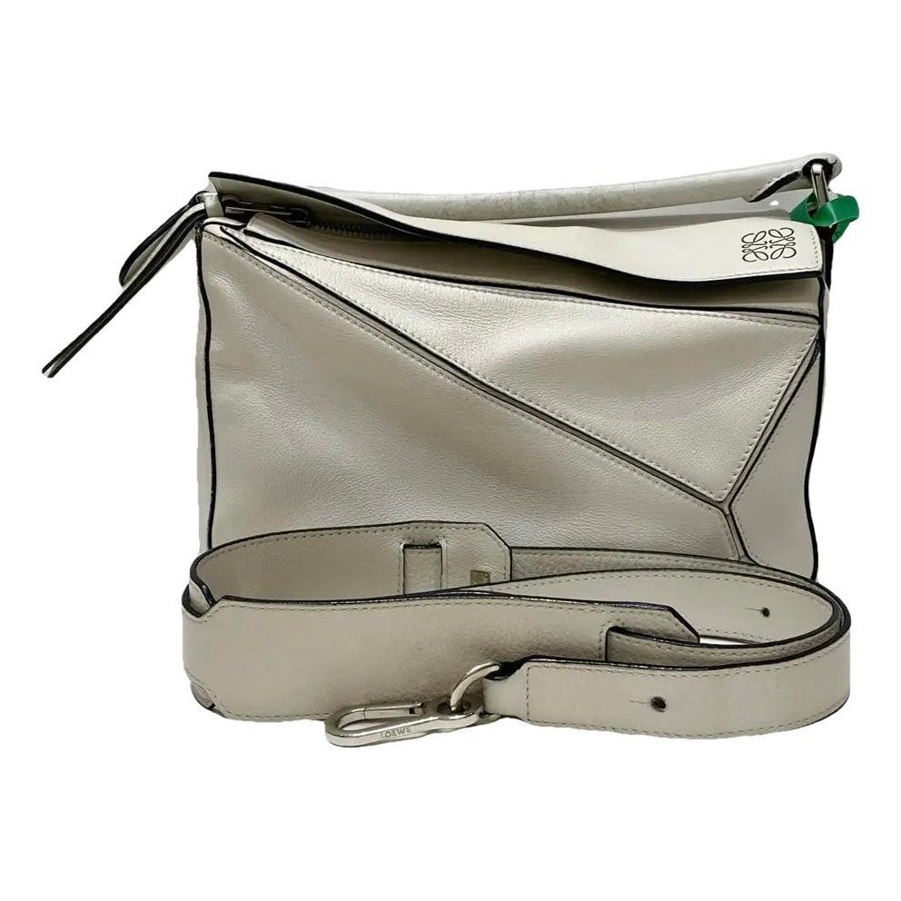 Puzzle leather crossbody bag