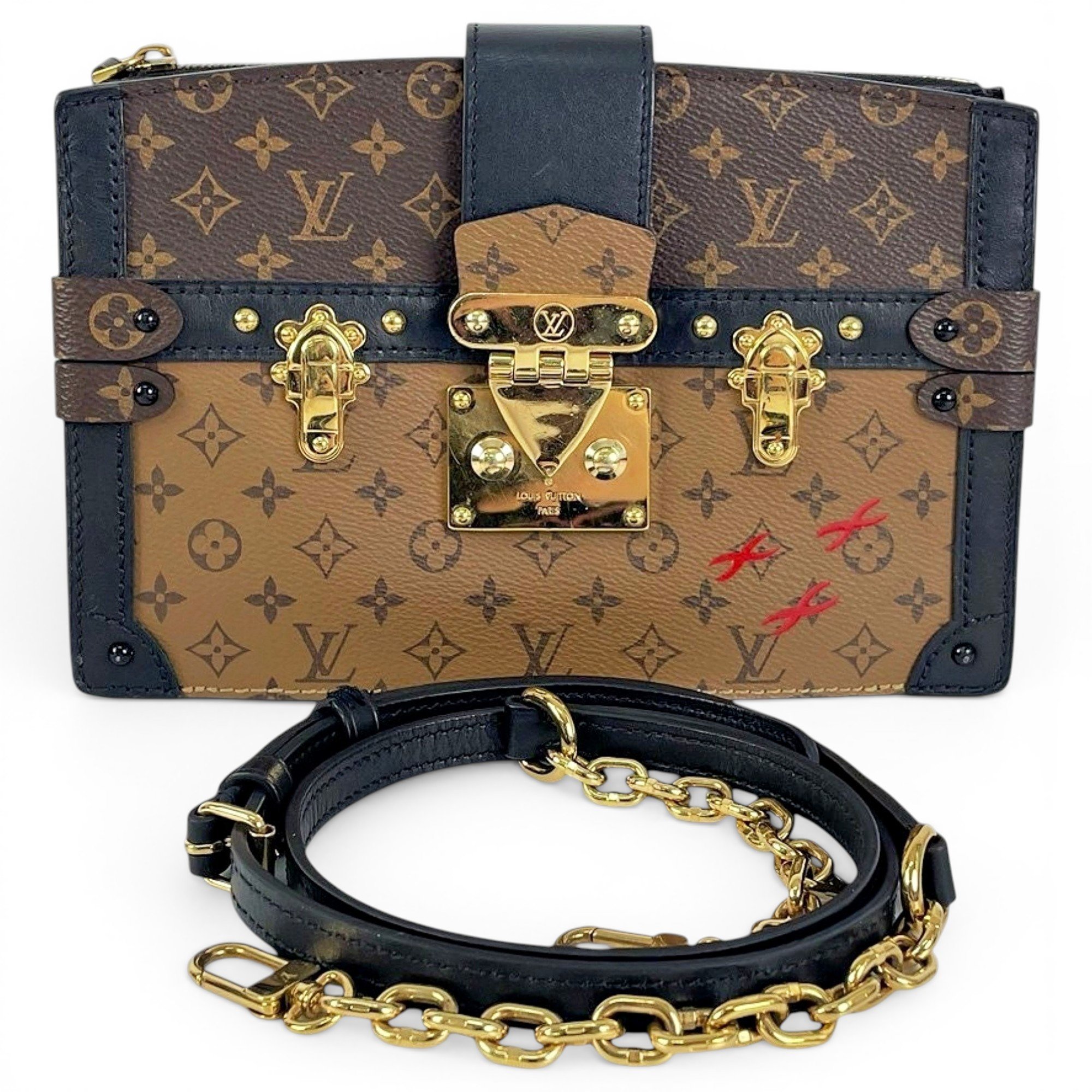 Pochette Trunk leather handbag