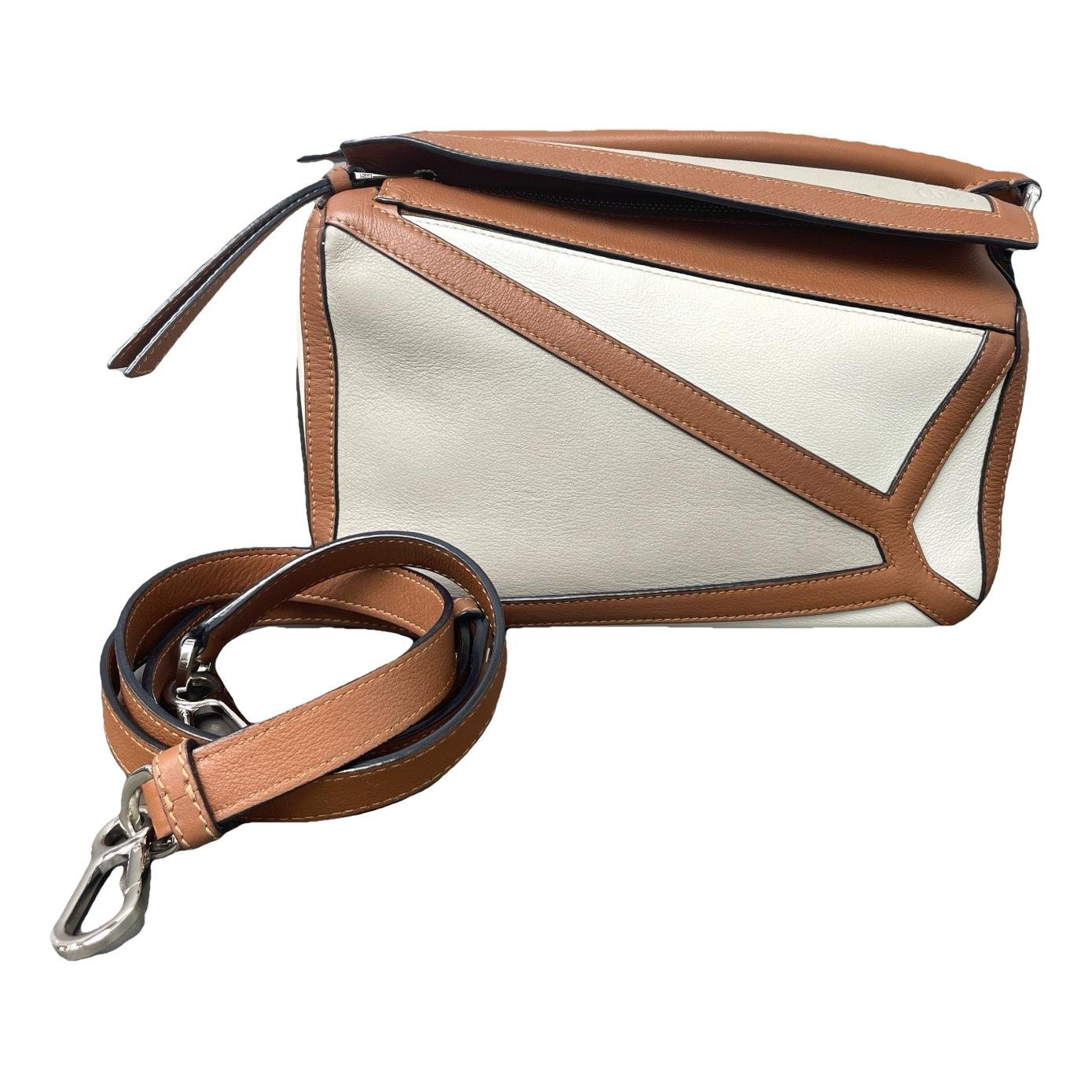 Puzzle leather handbag