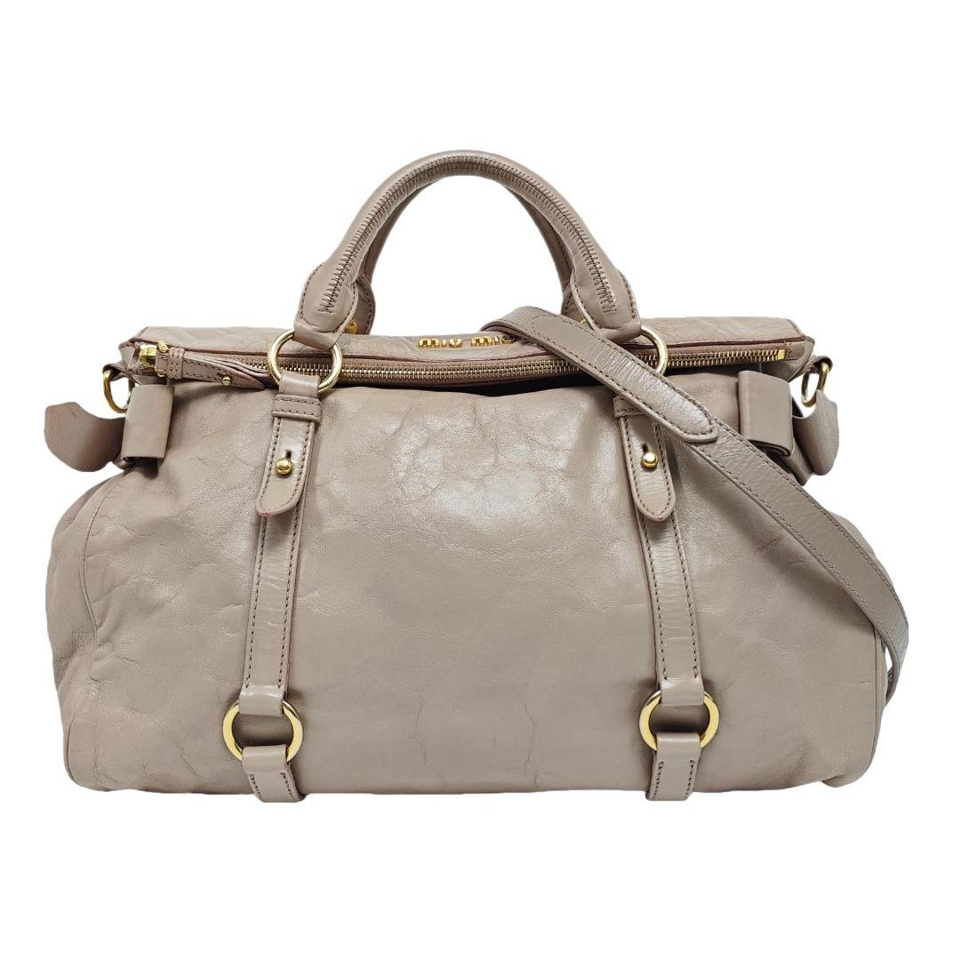 Bow bag leather handbag