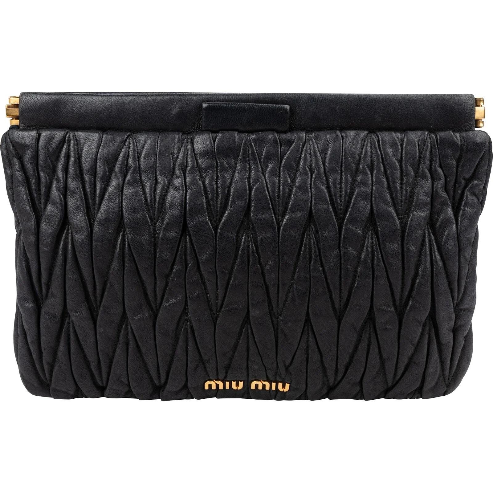 Matelassé leather clutch bag