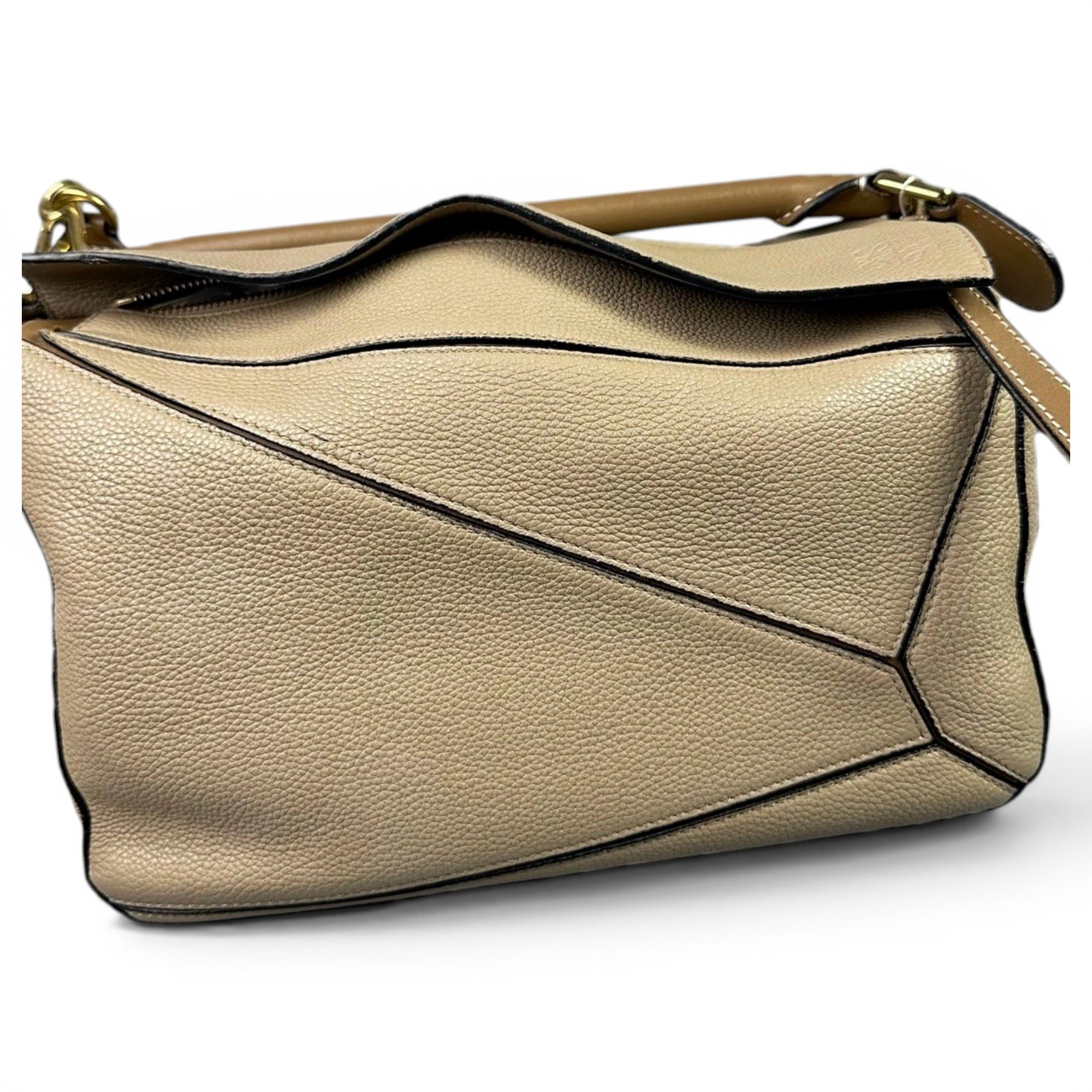 Puzzle leather handbag