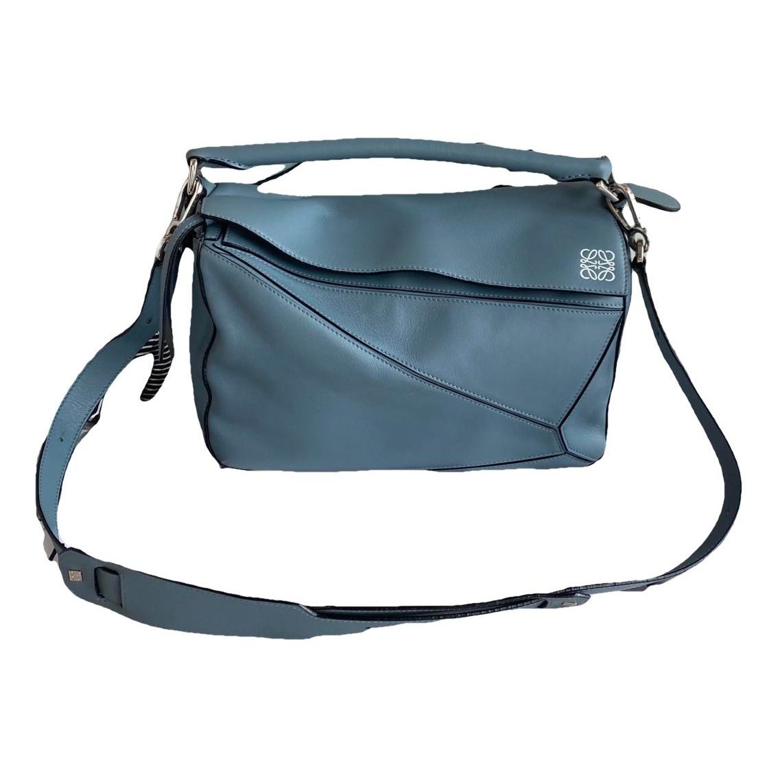 Puzzle leather handbag
