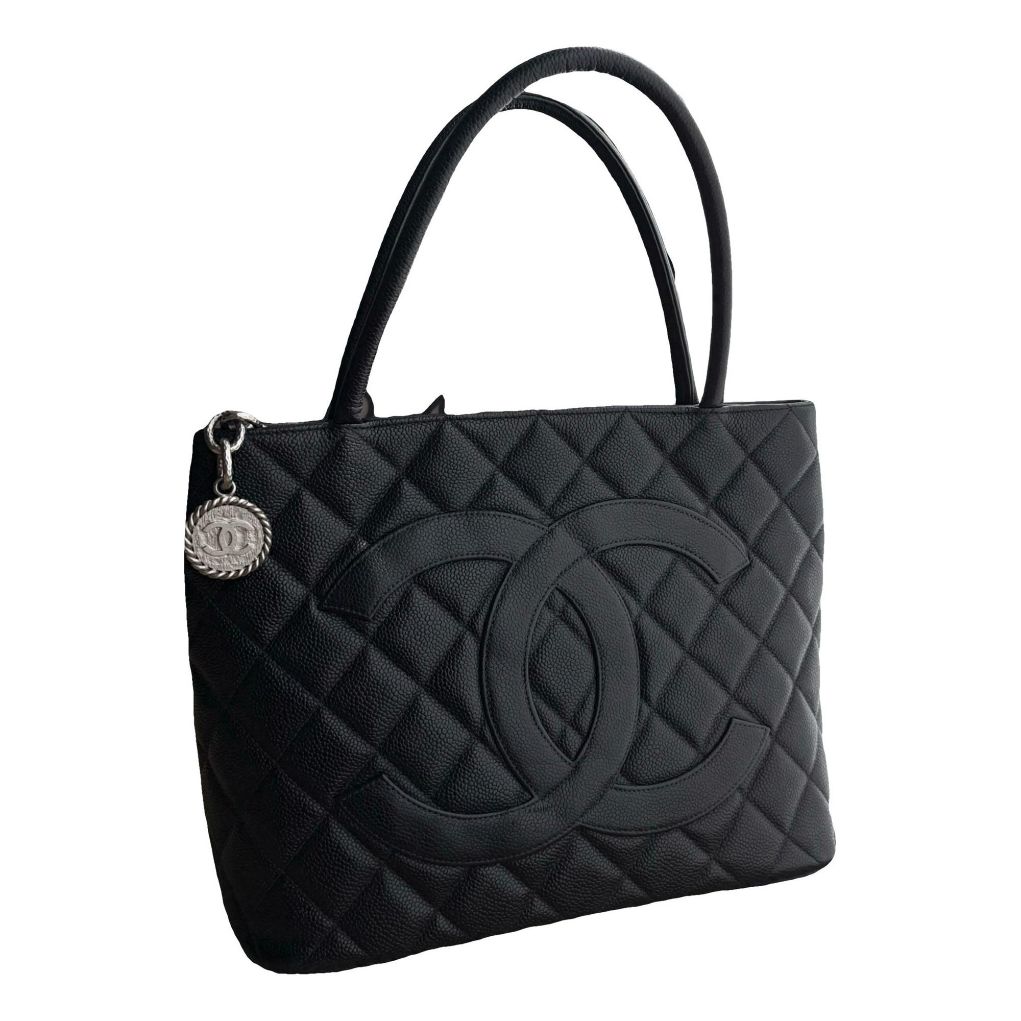 Médaillon leather handbag