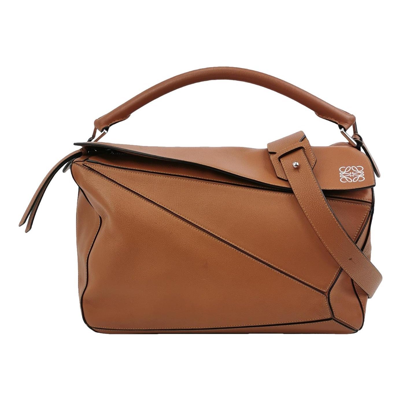 Puzzle leather handbag