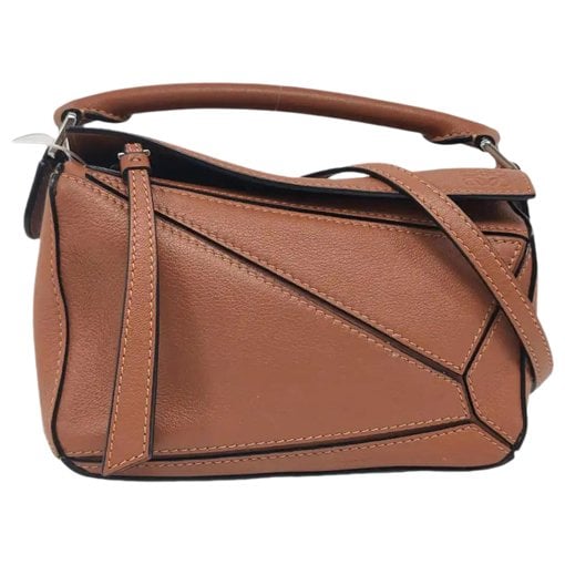 Puzzle leather handbag