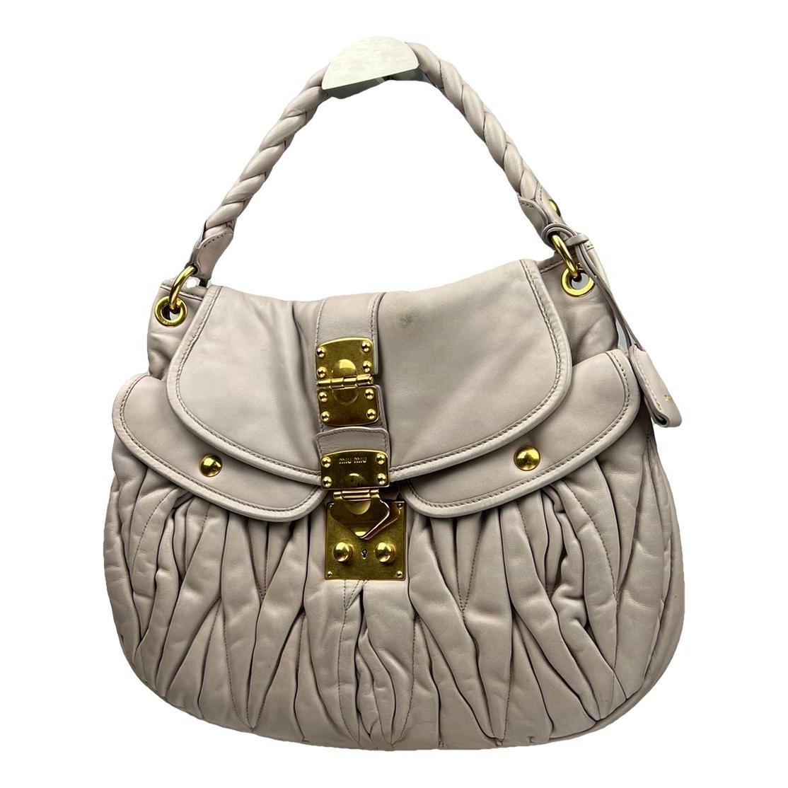 Coffer leather handbag