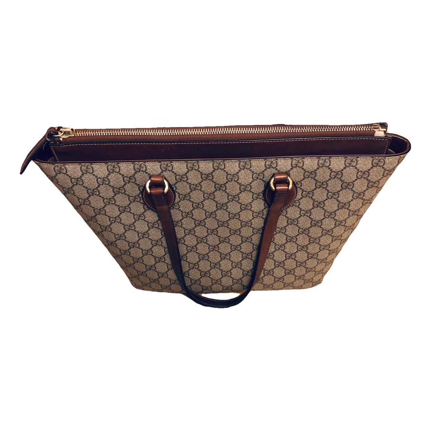 Ophidia Dome Top Handle vegan leather handbag