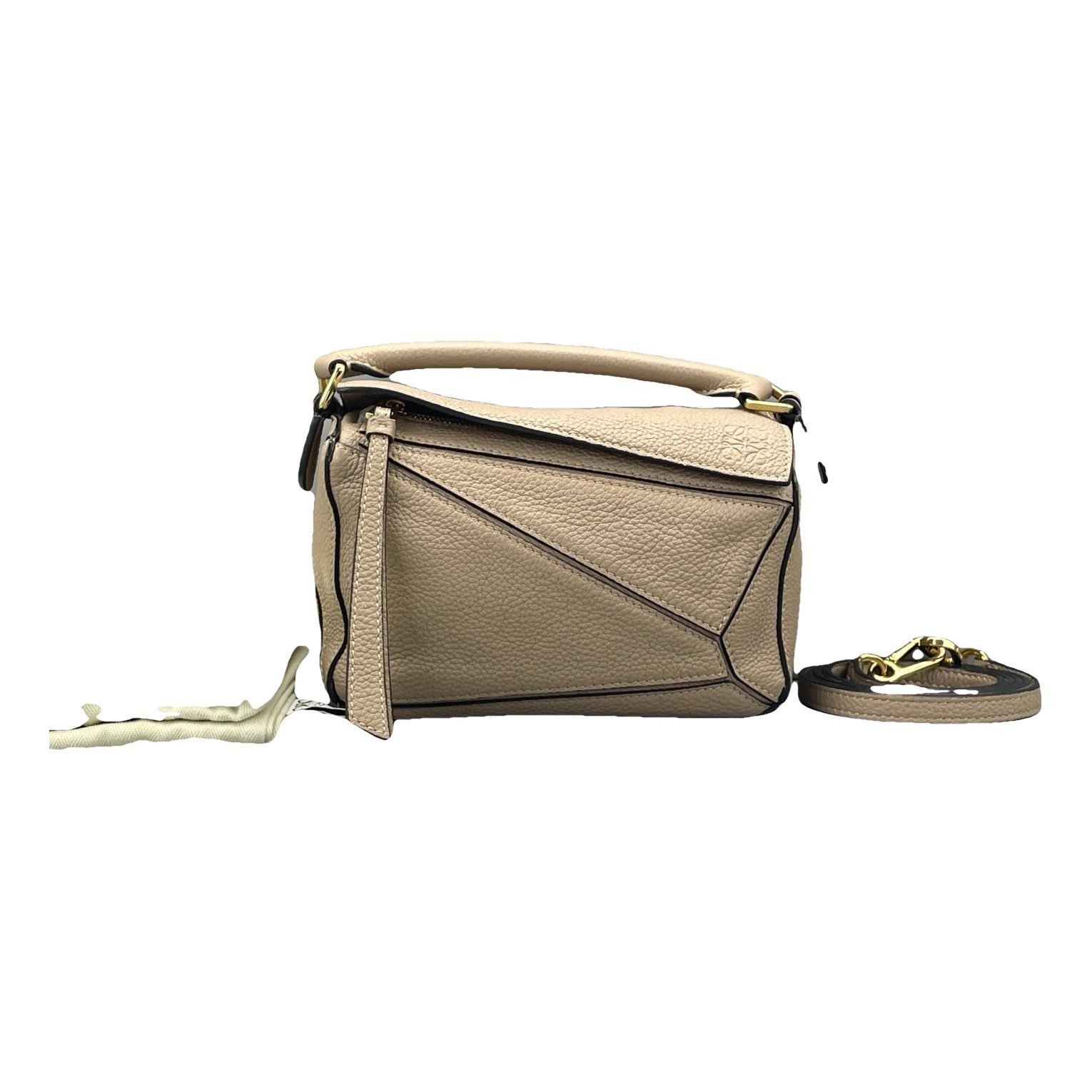 Puzzle leather handbag