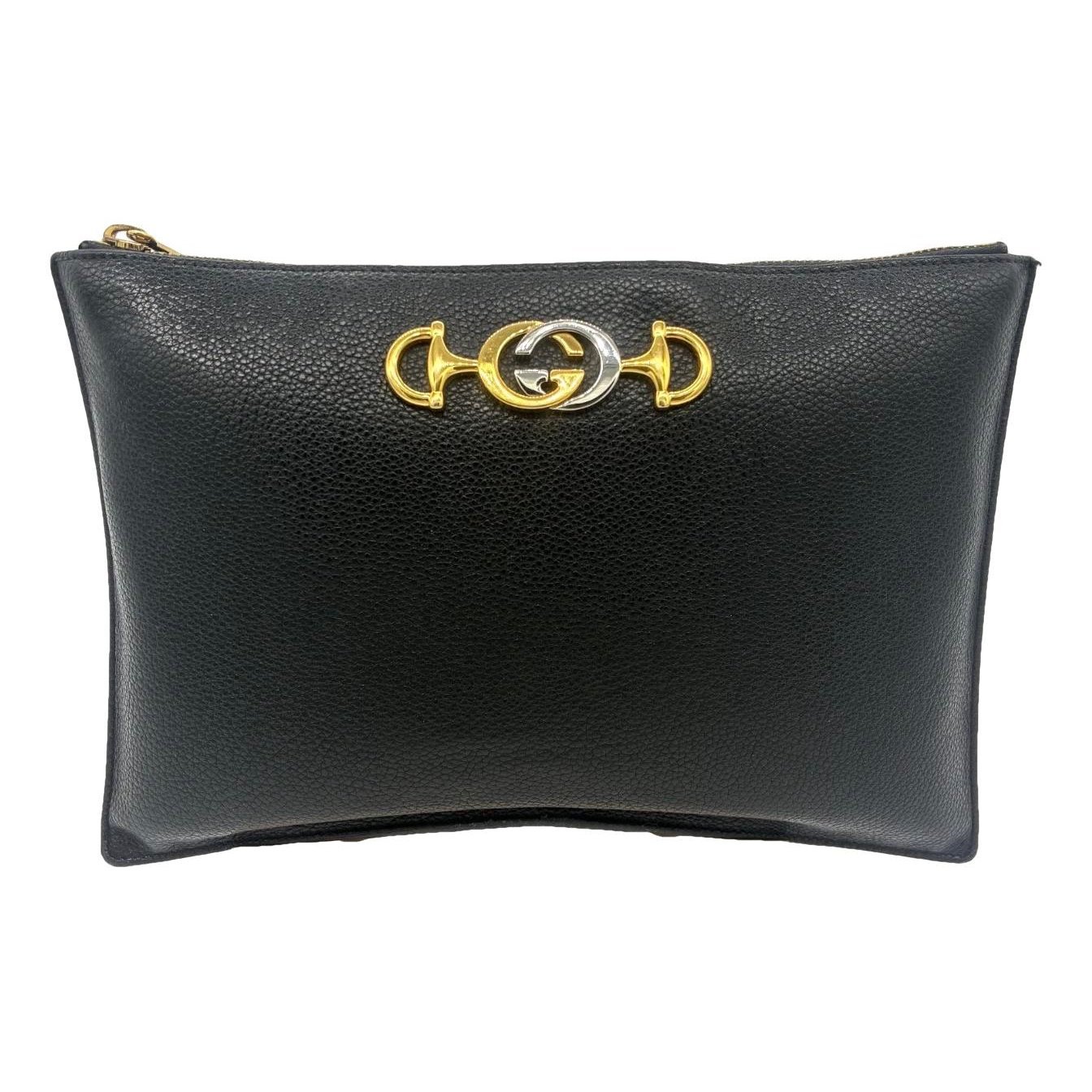Zumi leather clutch bag