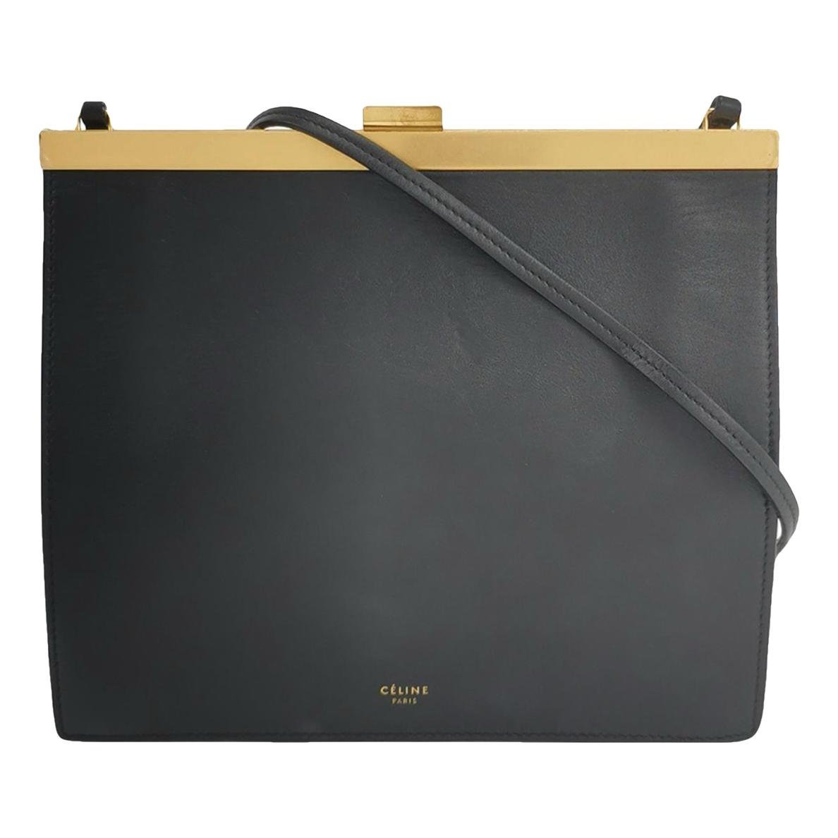 Clasp leather handbag