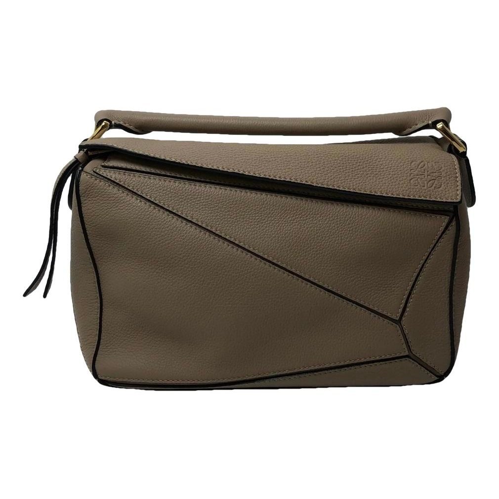 Puzzle leather handbag