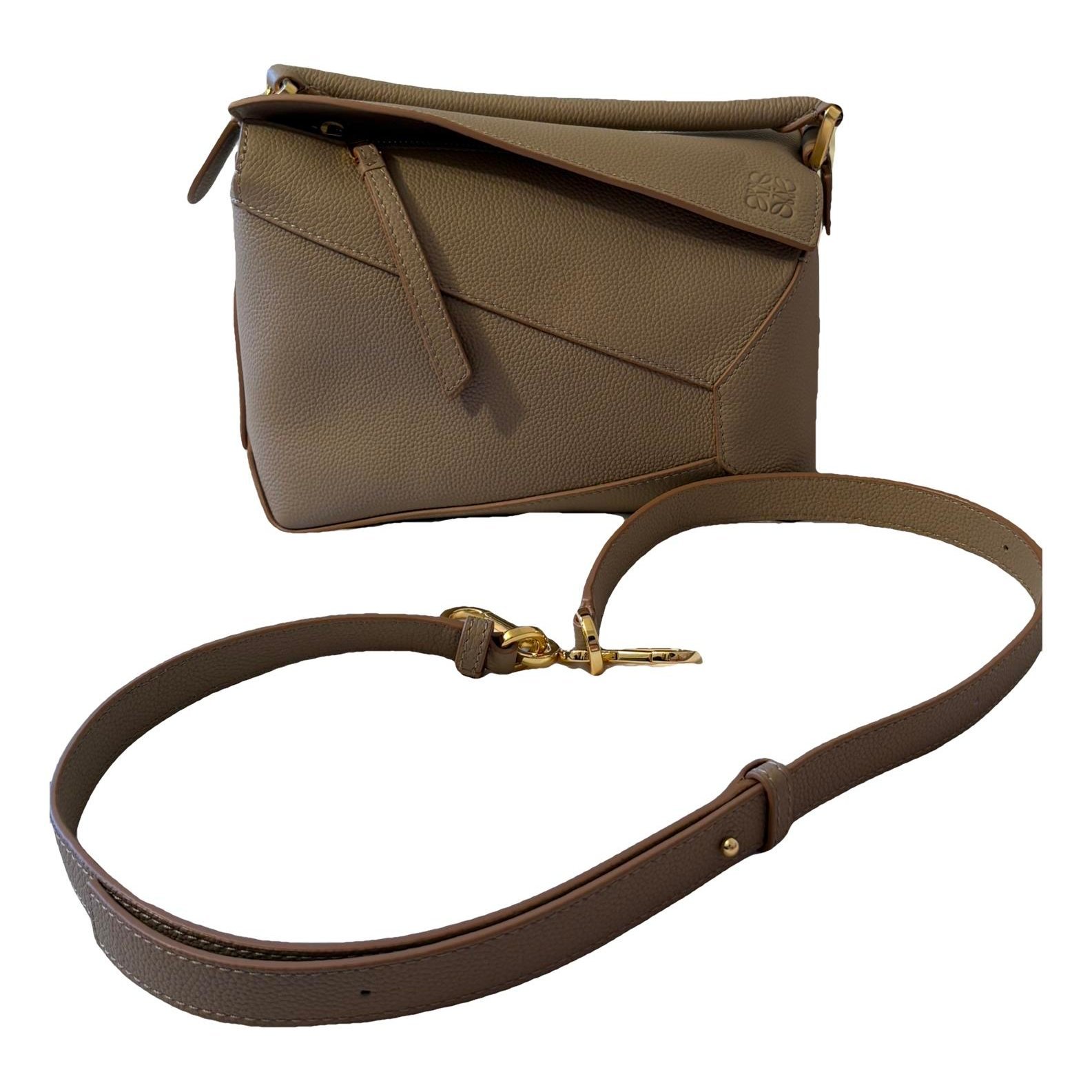 Puzzle leather handbag