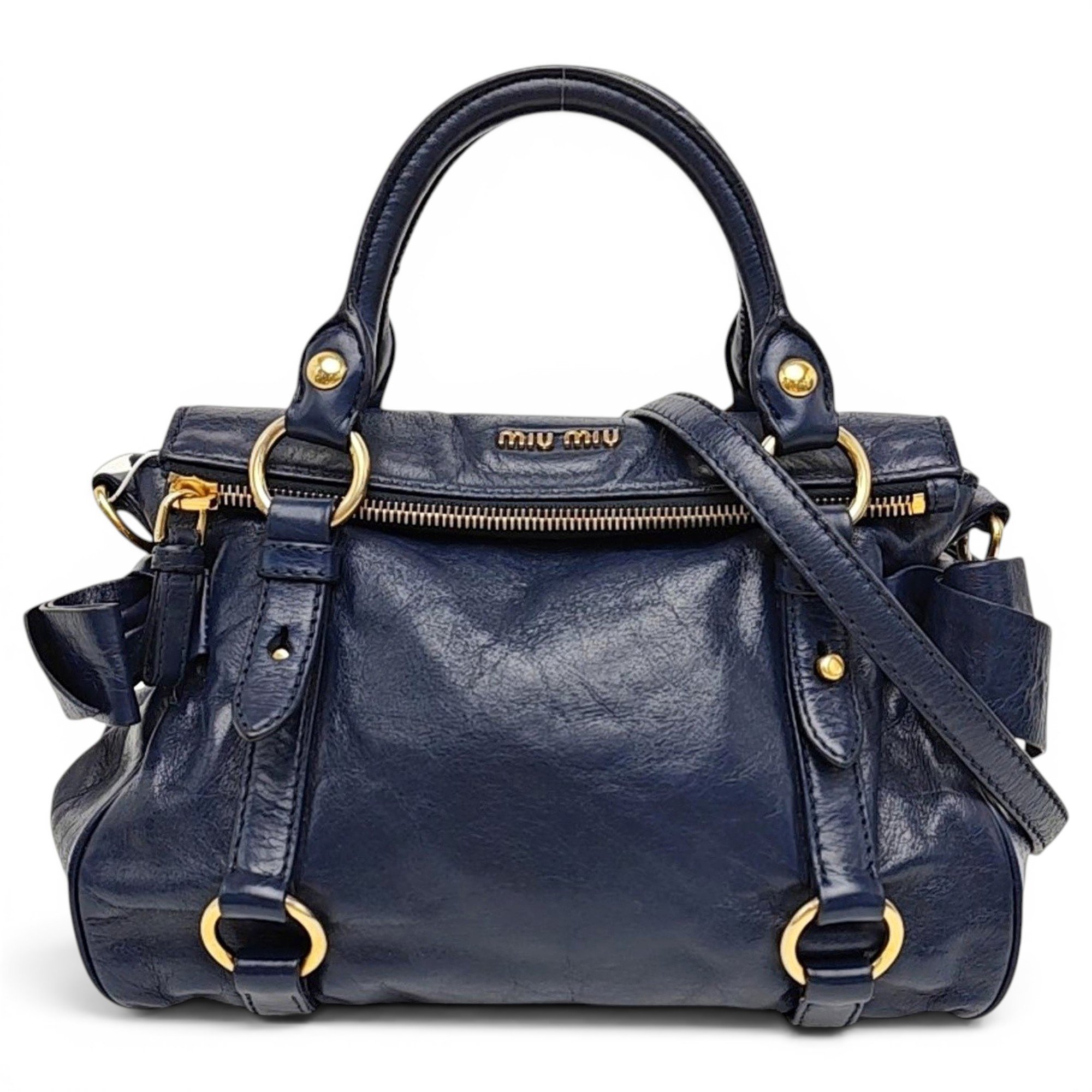 Bow bag leather handbag
