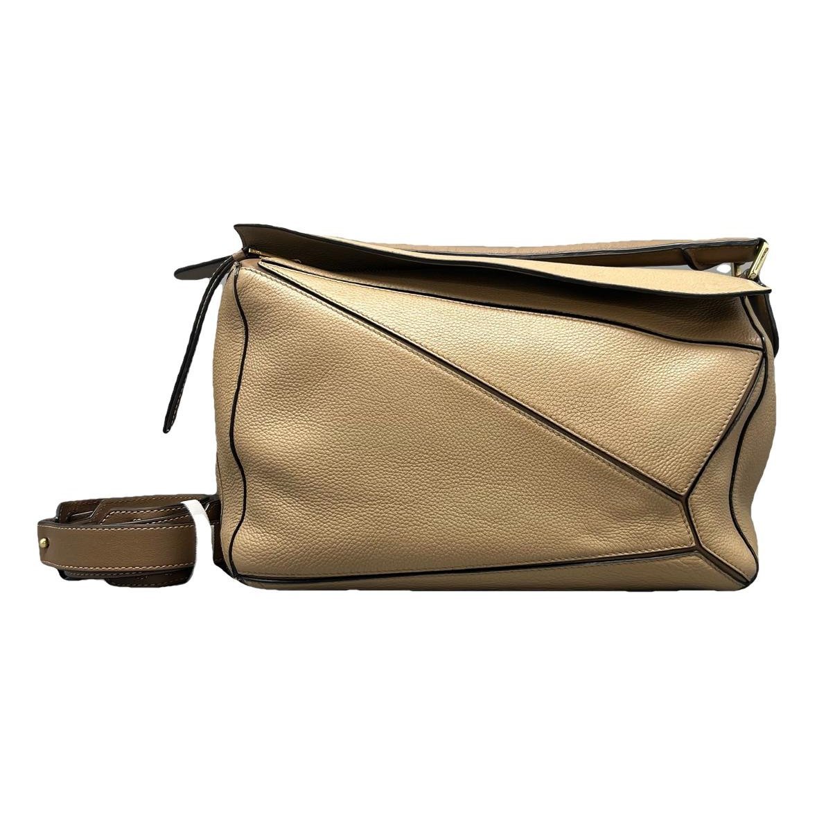 Puzzle leather handbag