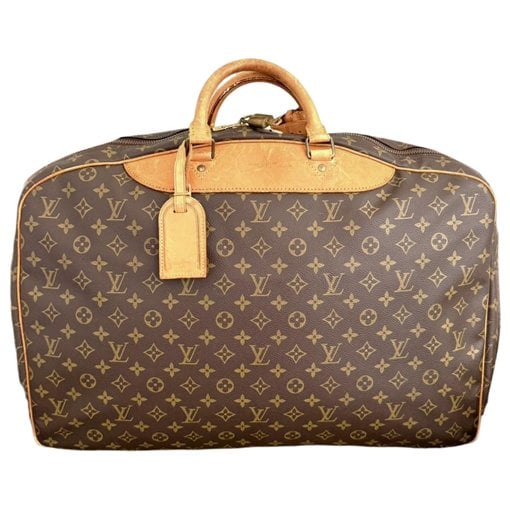 Alizé patent leather travel bag