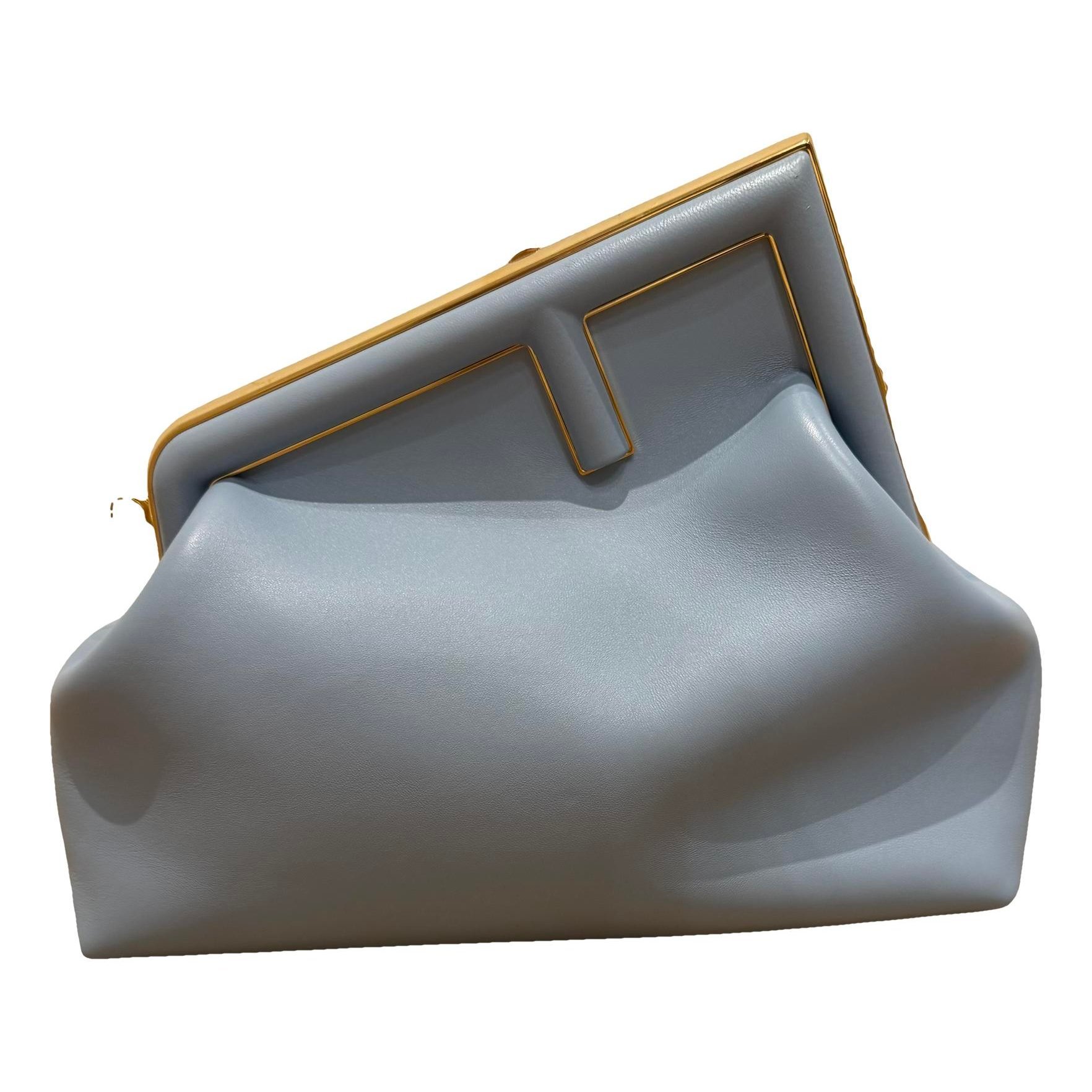 First leather handbag