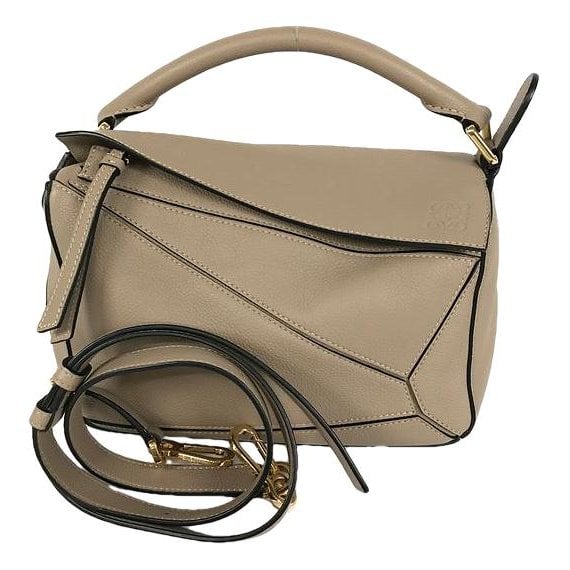 Puzzle leather handbag