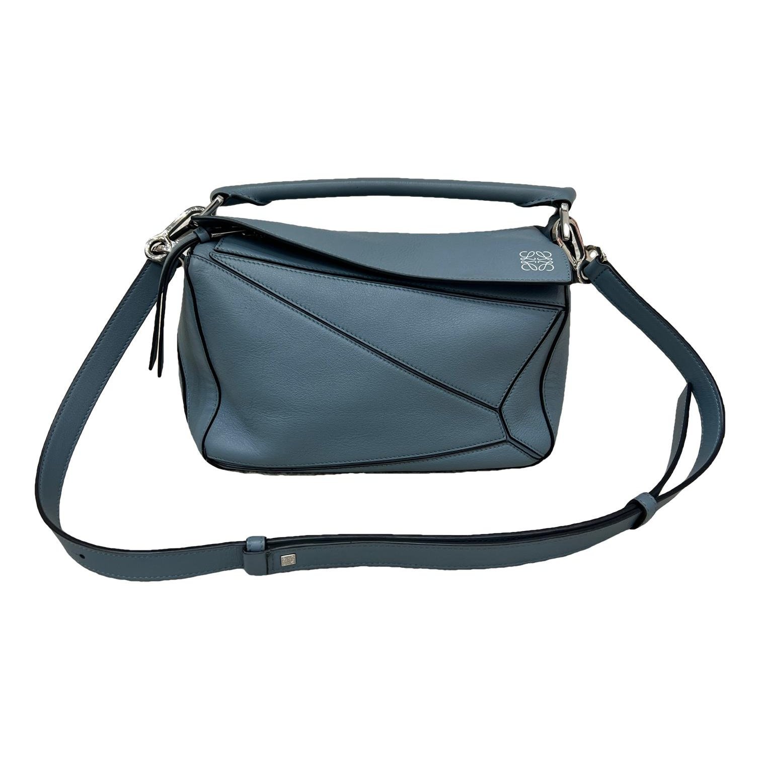 Puzzle leather handbag
