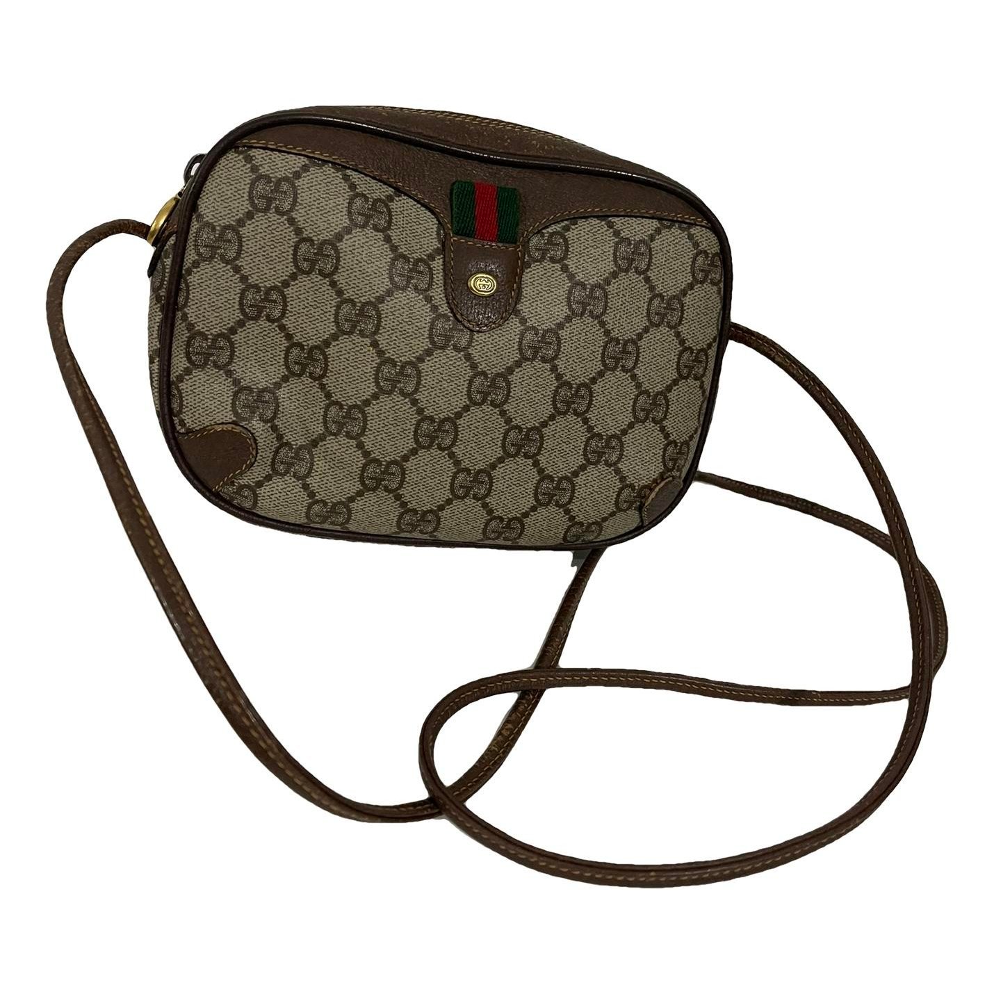 Ophidia leather clutch bag