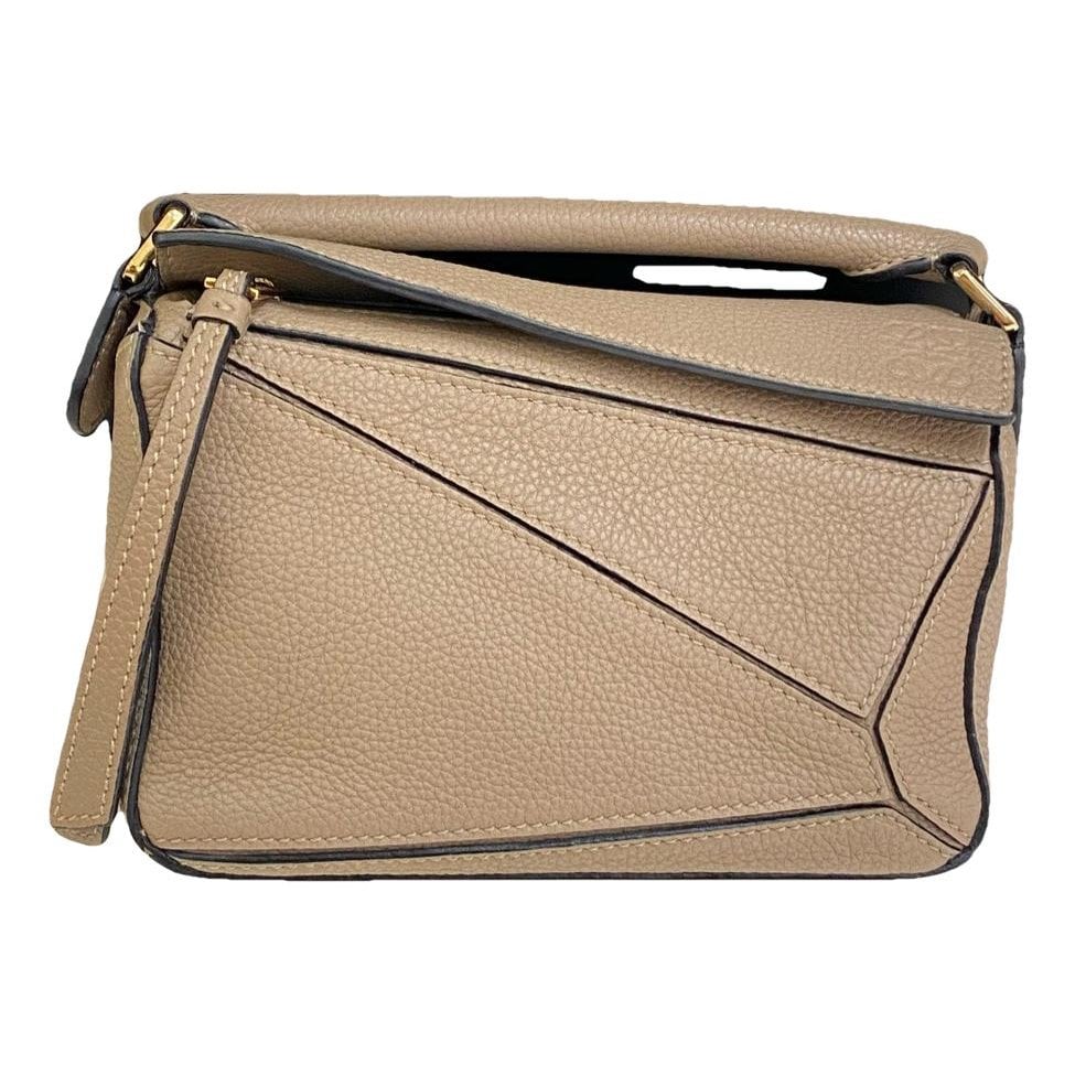 Puzzle leather handbag
