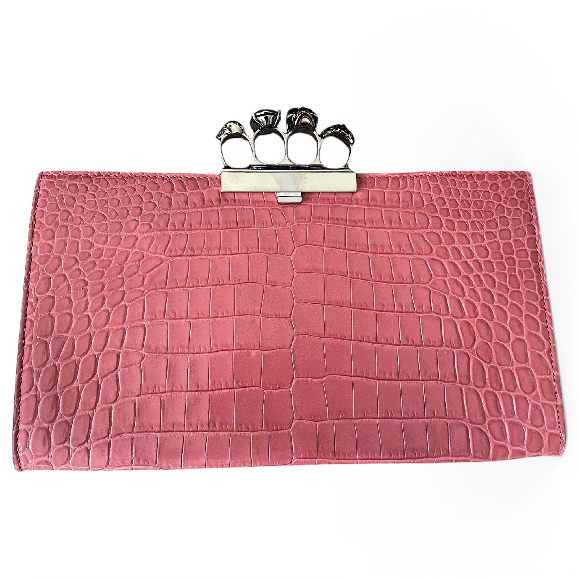 Knuckle leather clutch bag