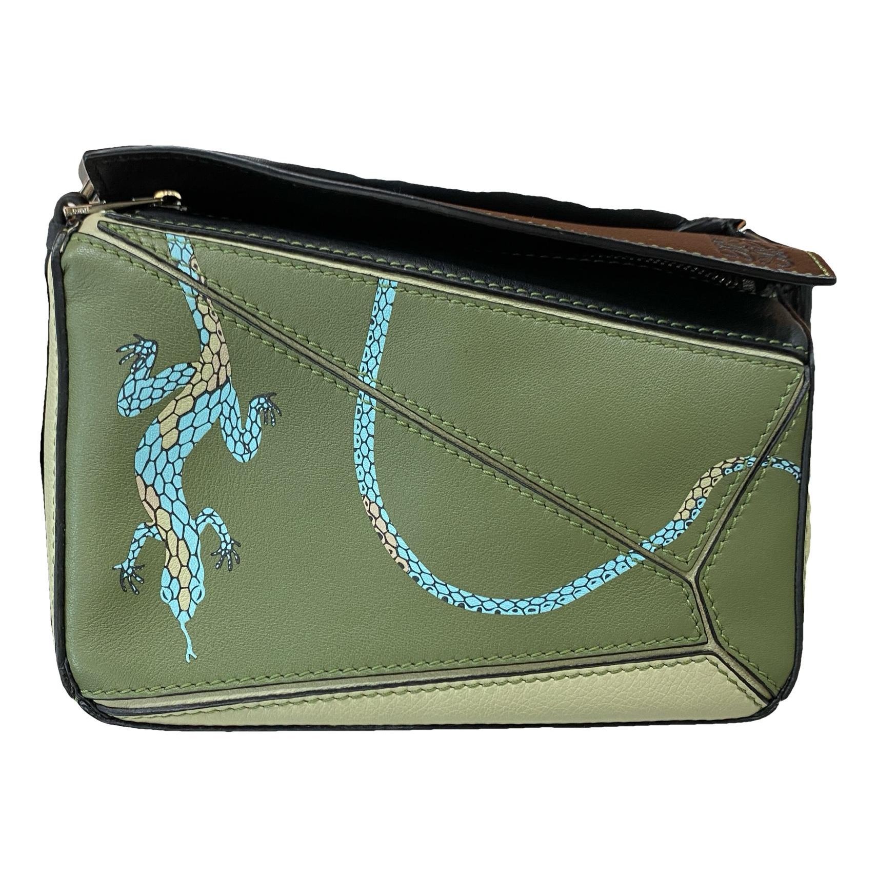 Puzzle leather handbag