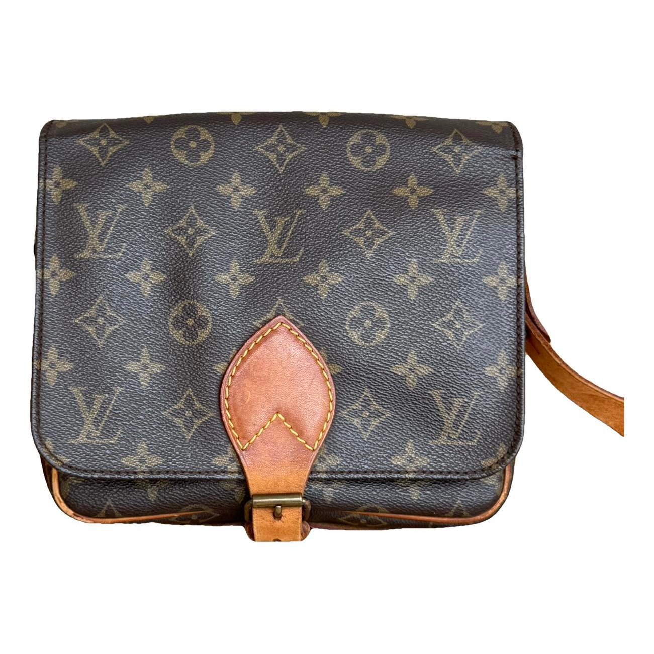 Cartouchière leather crossbody bag