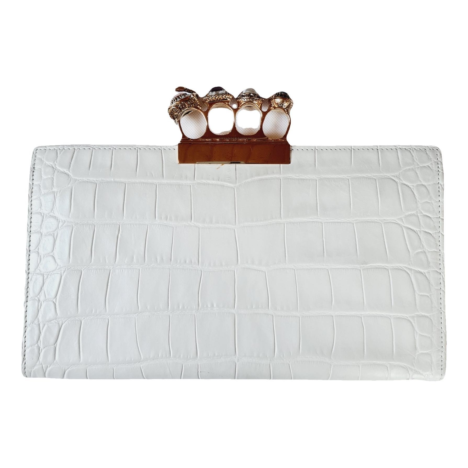 Knuckle leather clutch bag