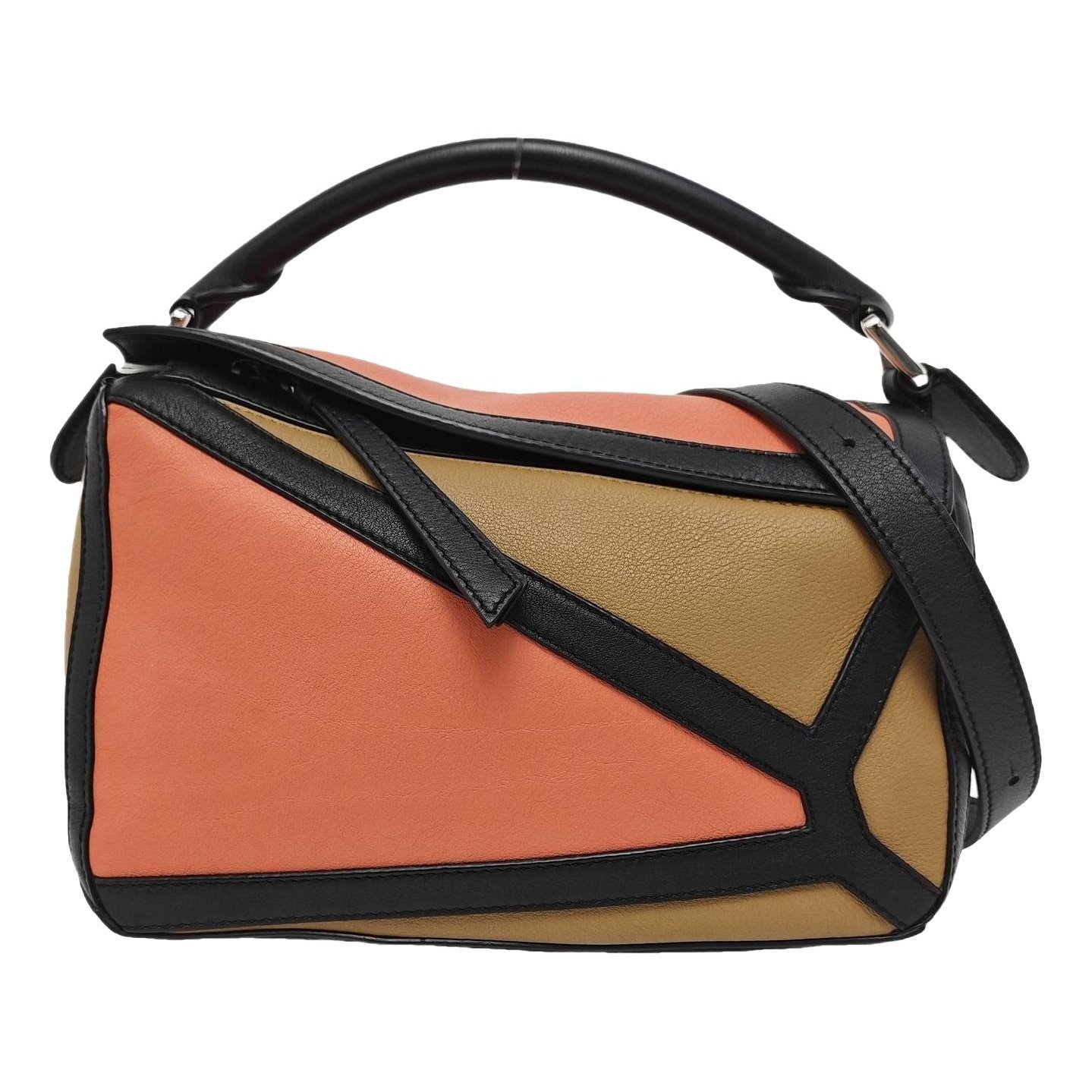 Puzzle leather handbag