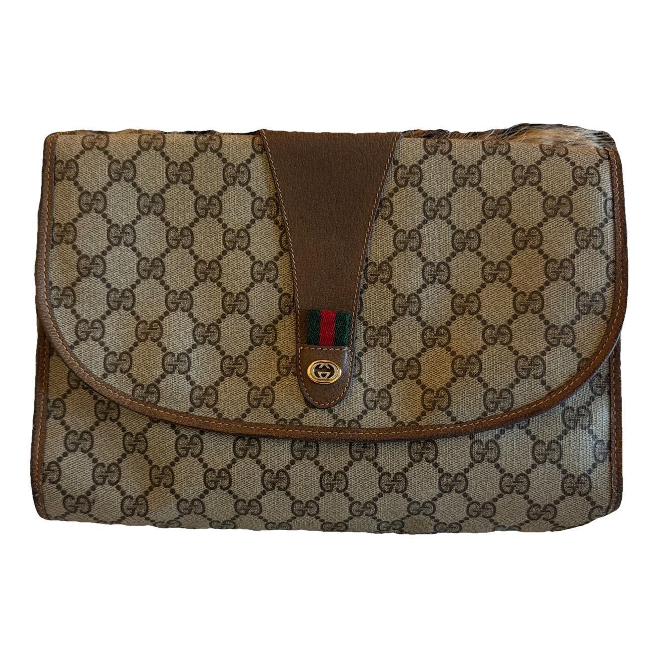 Ophidia leather clutch bag