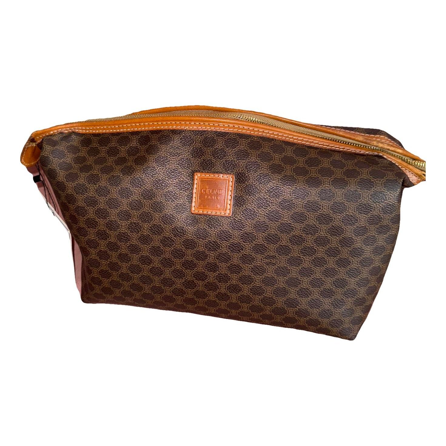 Triomphe Vintage leather clutch bag