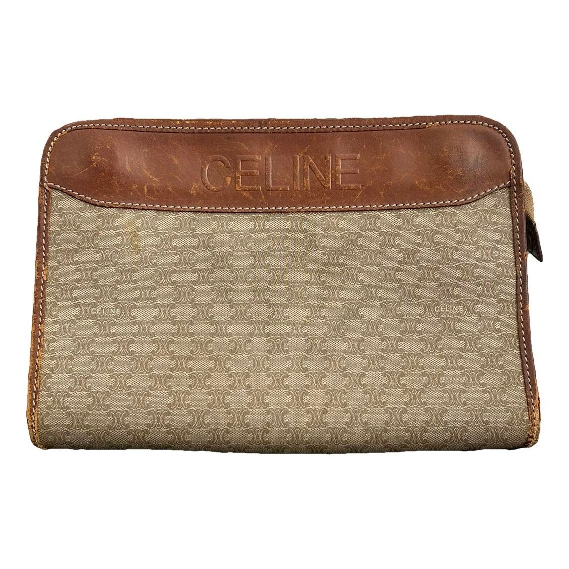 Triomphe Vintage leather clutch bag