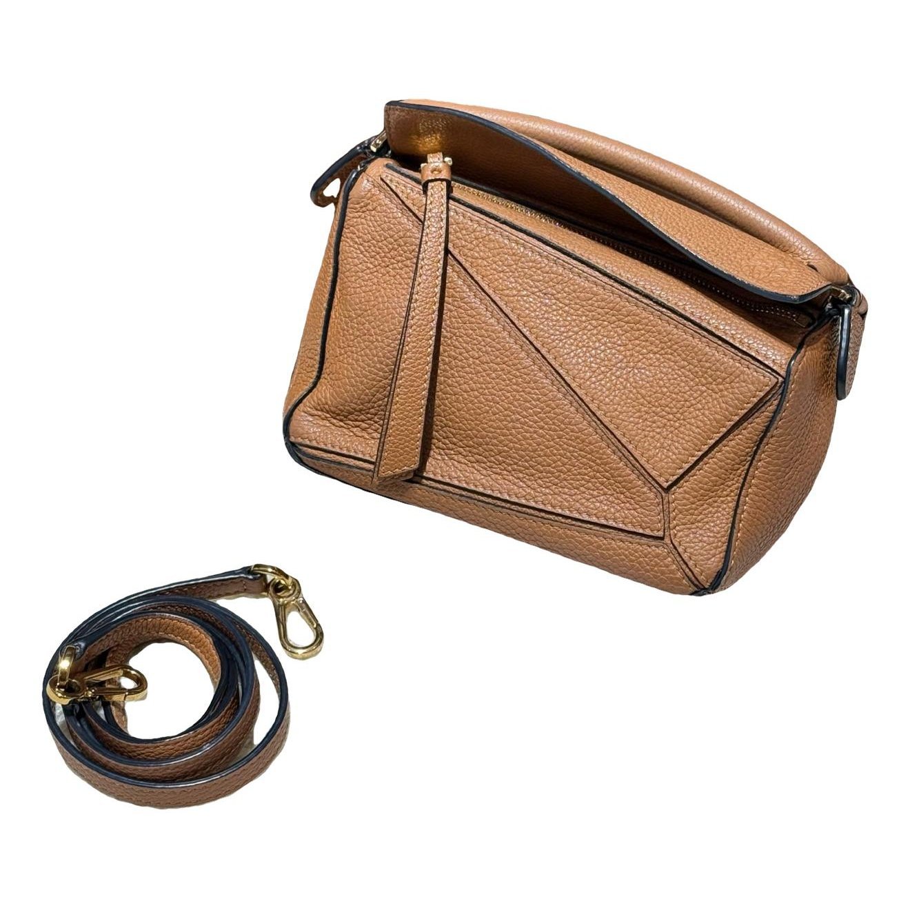 Puzzle leather handbag