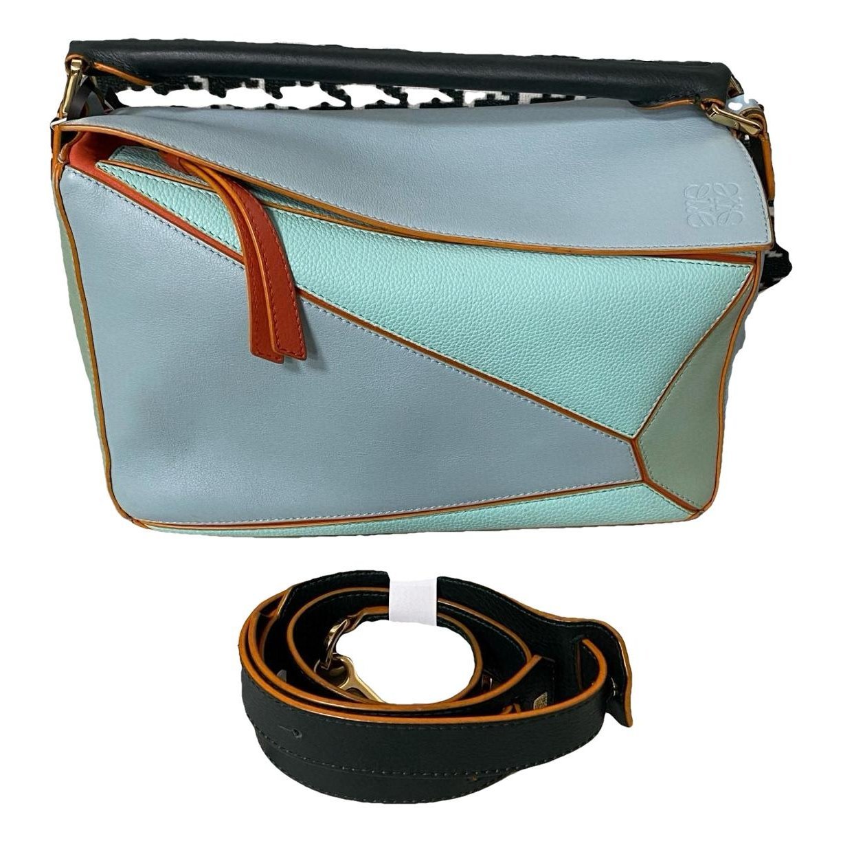 Puzzle leather handbag
