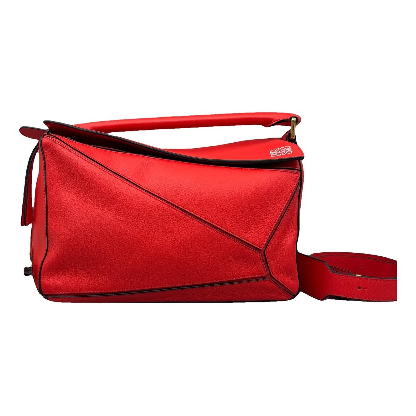 Puzzle leather handbag