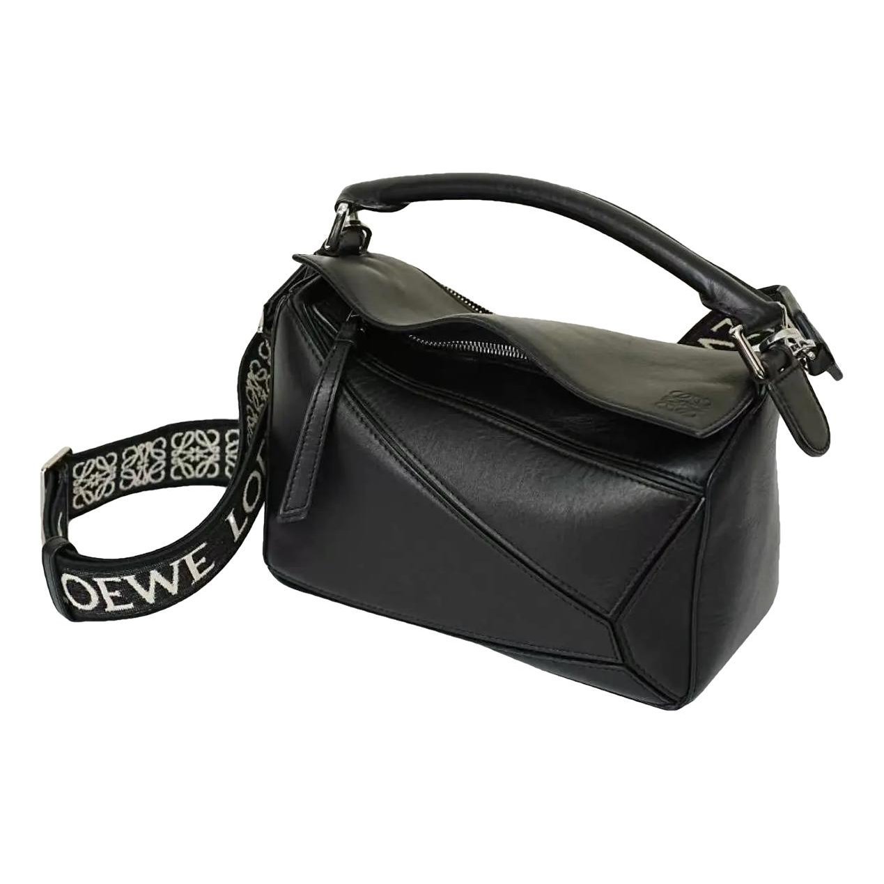 Puzzle leather handbag