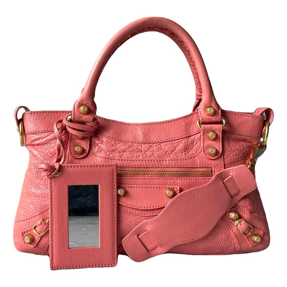 First leather handbag